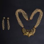 The Lavish Layers of Elegance - Golden Multilayered Pearl Neckpiece 1