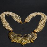 The Lavish Layers of Elegance - Golden Multilayered Pearl Neckpiece 3